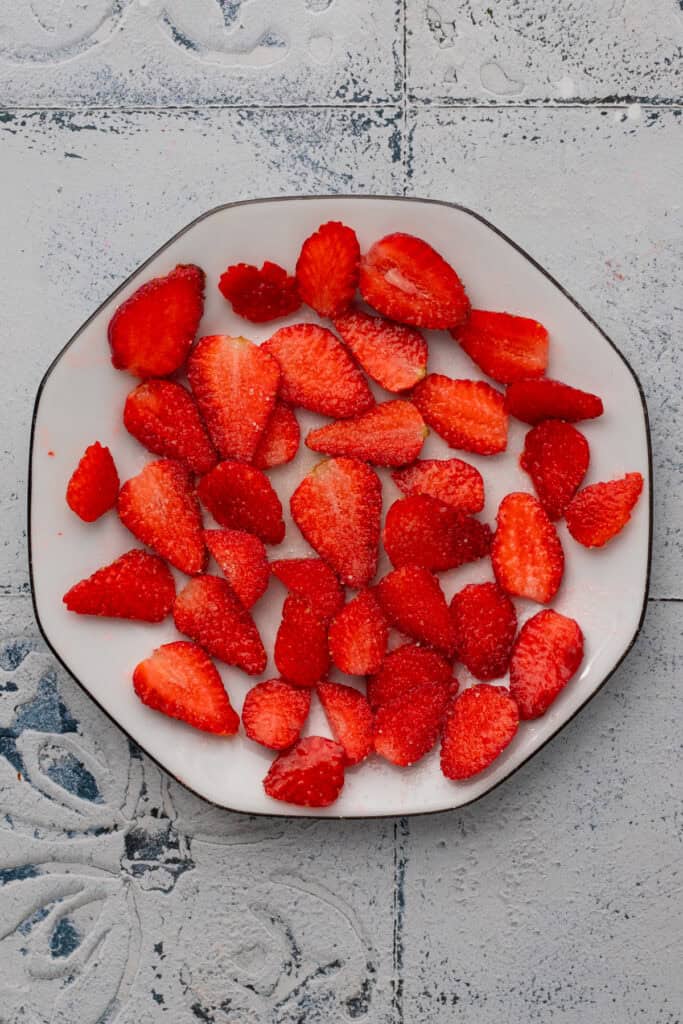 sliced strawberries on a plate
