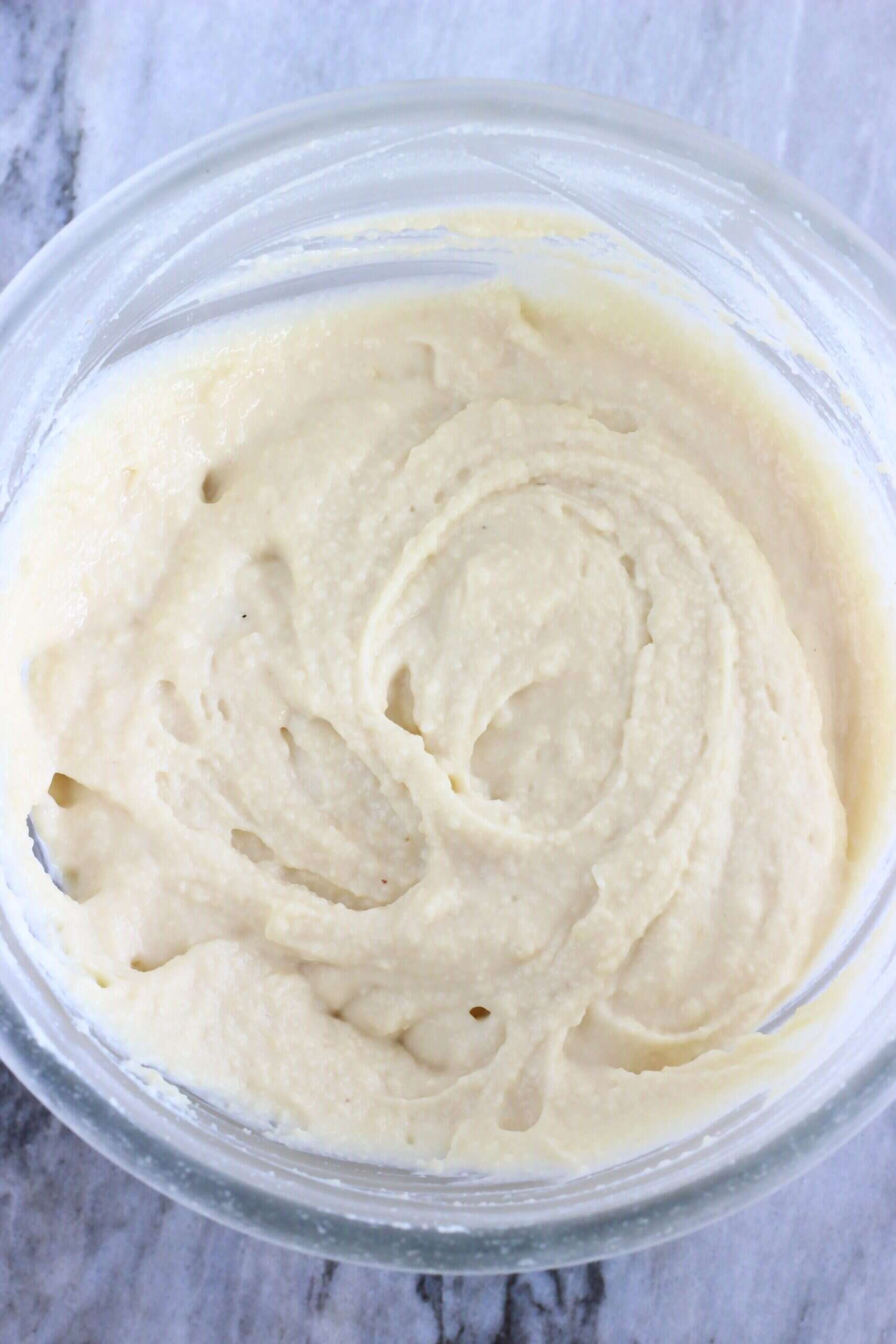 Raw gluten-free vegan yogurt muffins batter in a mixing bowl