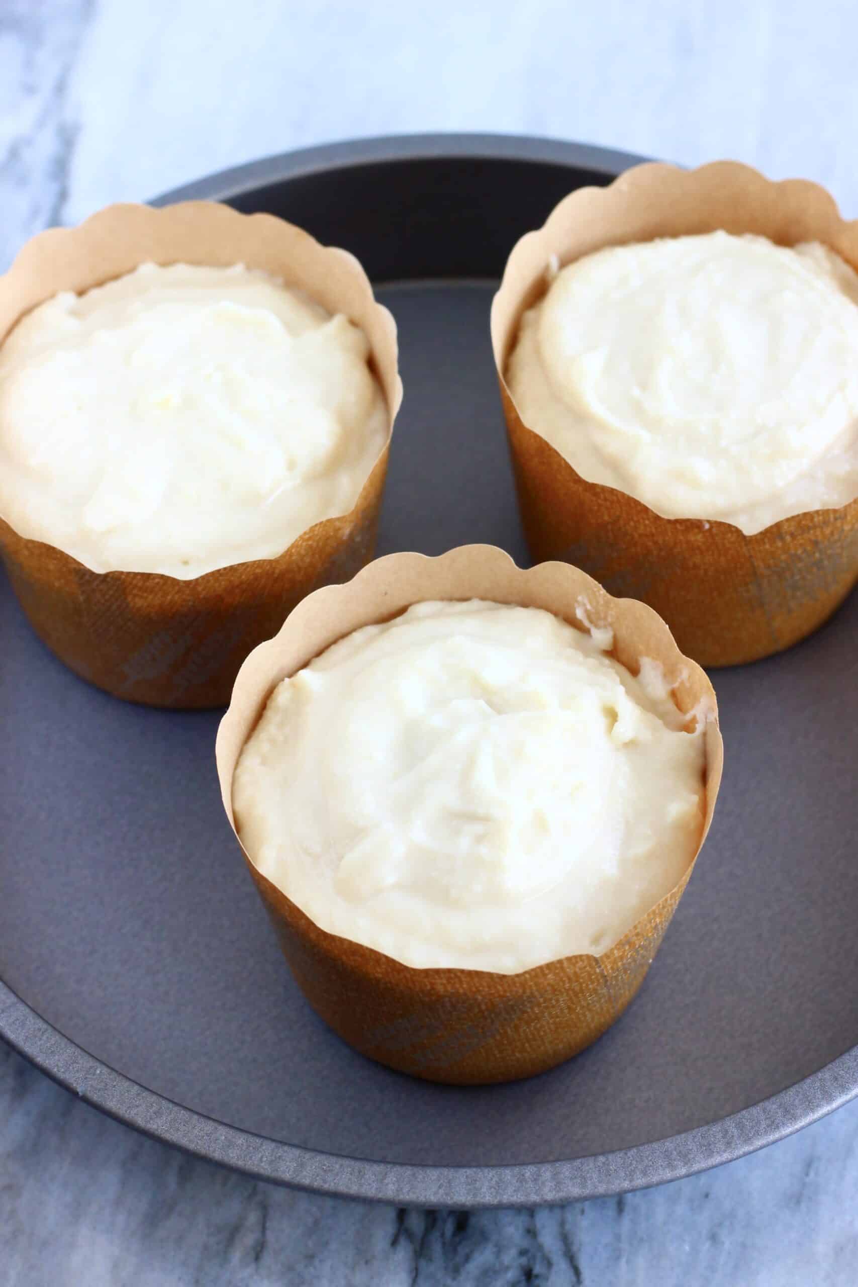 Raw gluten-free vegan yogurt muffins batter in muffin cases