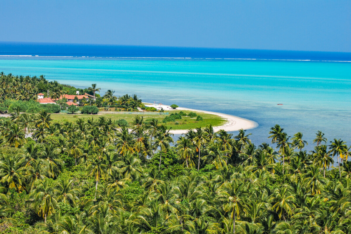 Coconut-fringed Minicoy Island with turquoise lagoon in Lakshadweep