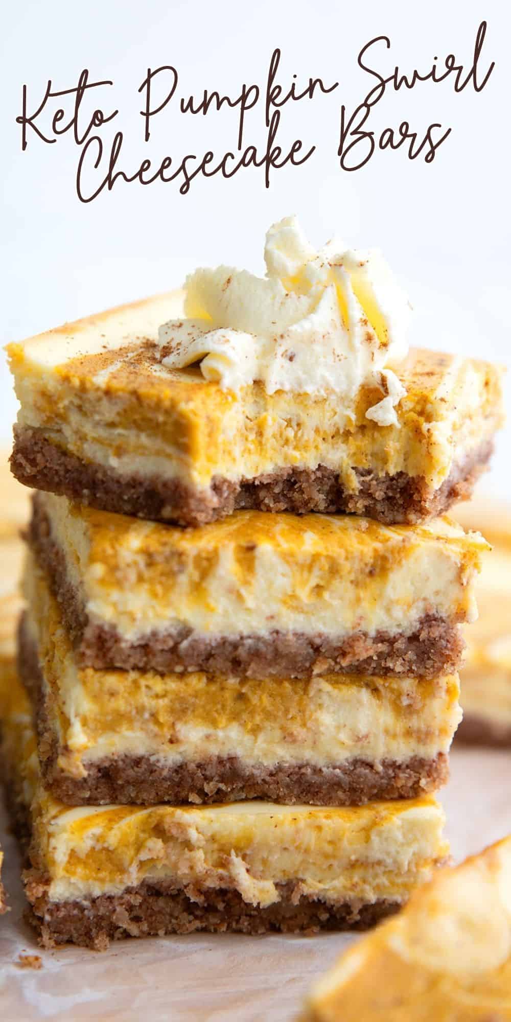 Titled image of a stack of keto pumpkin cheesecake bars with a bite taken out of the top one.