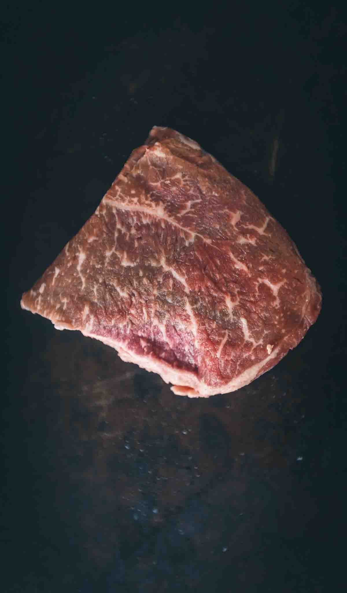 Raw ranch steak.