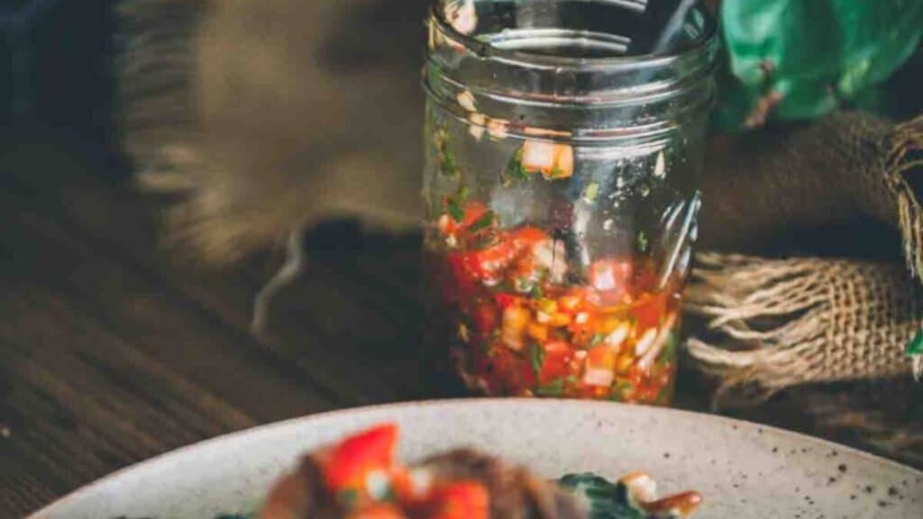 Jar of red chimichurri.