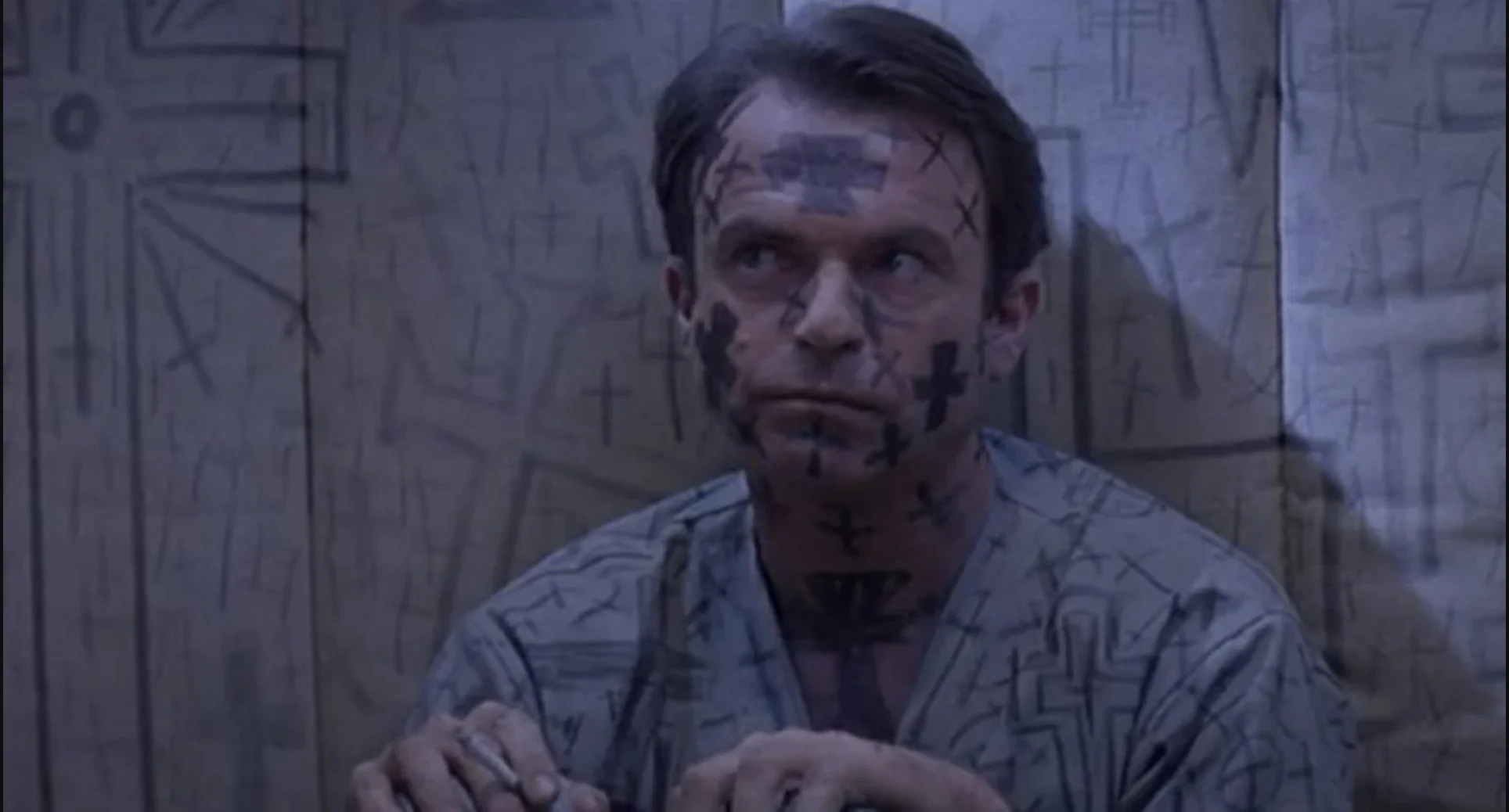 Sam Neill in John Carpenter's In the Mouth of Madness, screening October 9 in Regal's 31 Screams on Screen