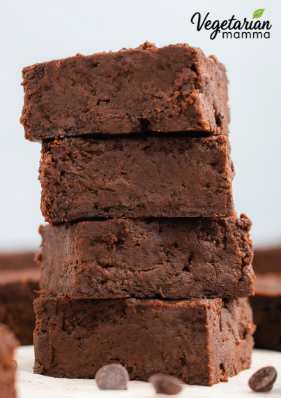 Close-up shot of 3 moist chocolate chip brownies in a stack