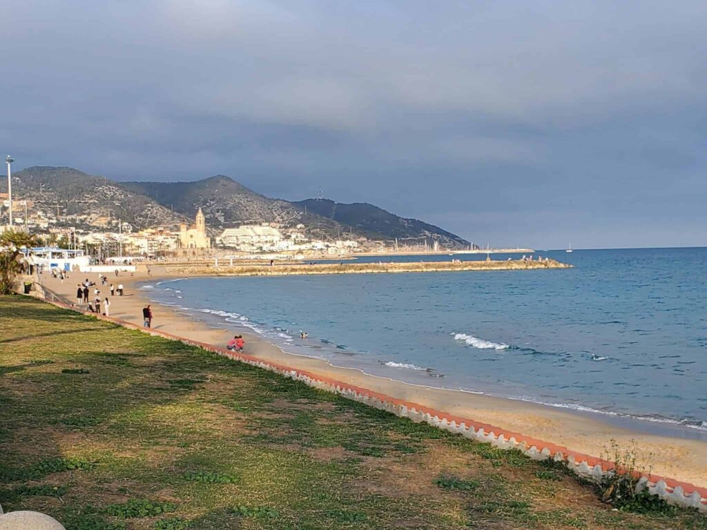 When visiting Barcelona, take a day trip to Sitges for a fun day on the beach and do some people watching