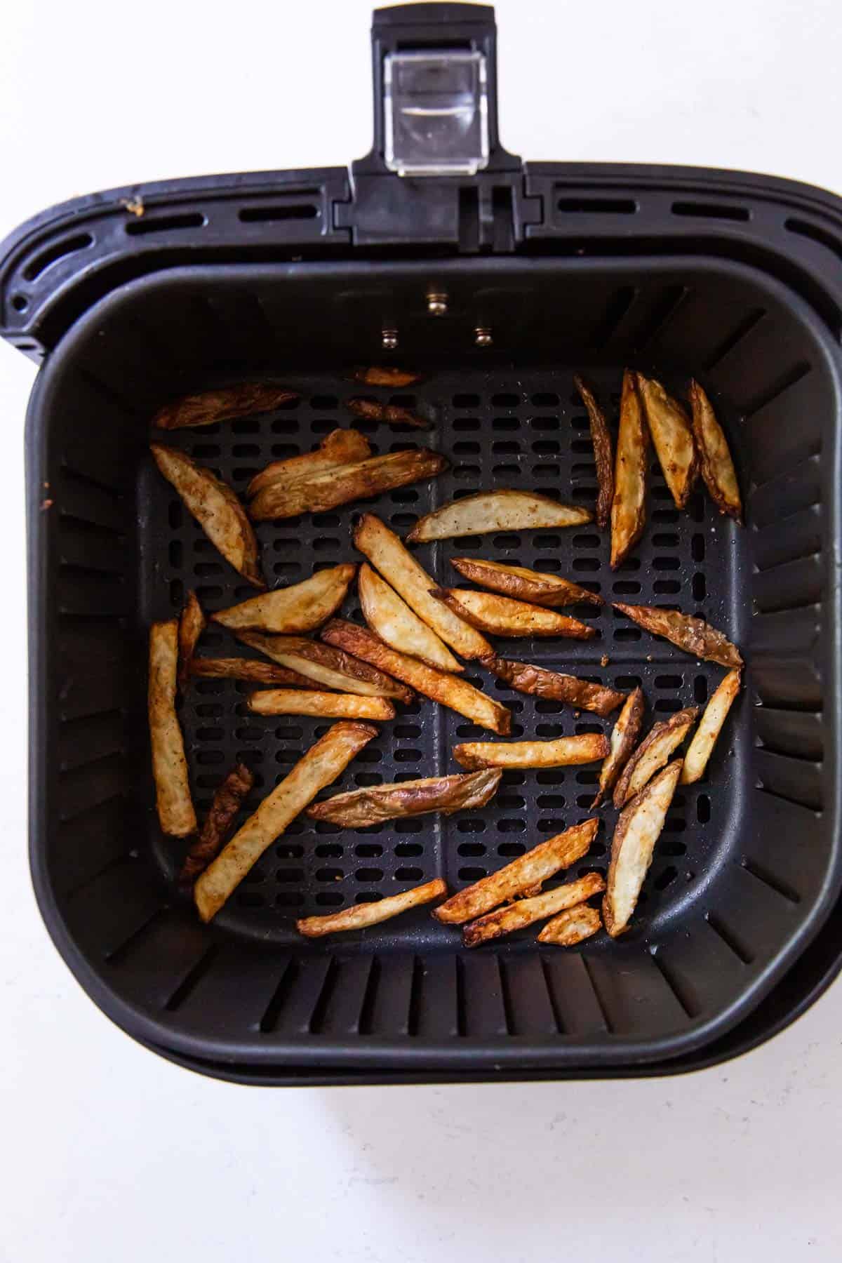 Golden brown crispy potatoes in the air fryer. 
