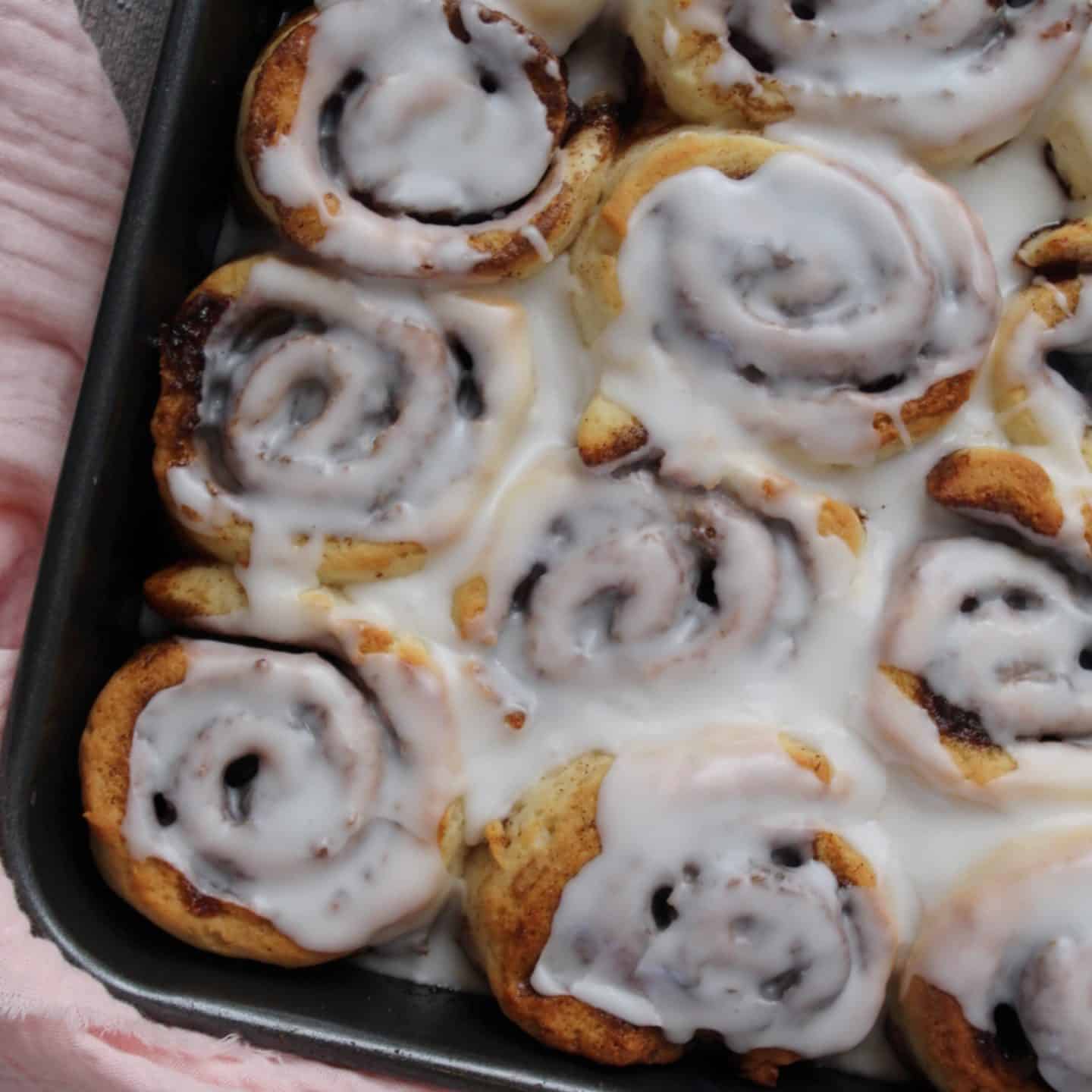 Gluten free cinnamon rolls in a tin.