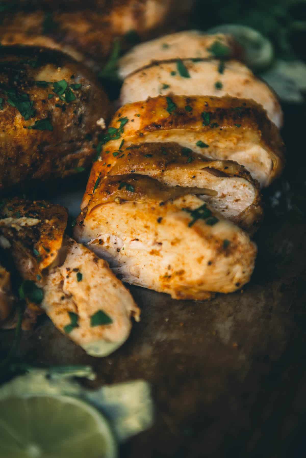 Sliced chicken on a platter.