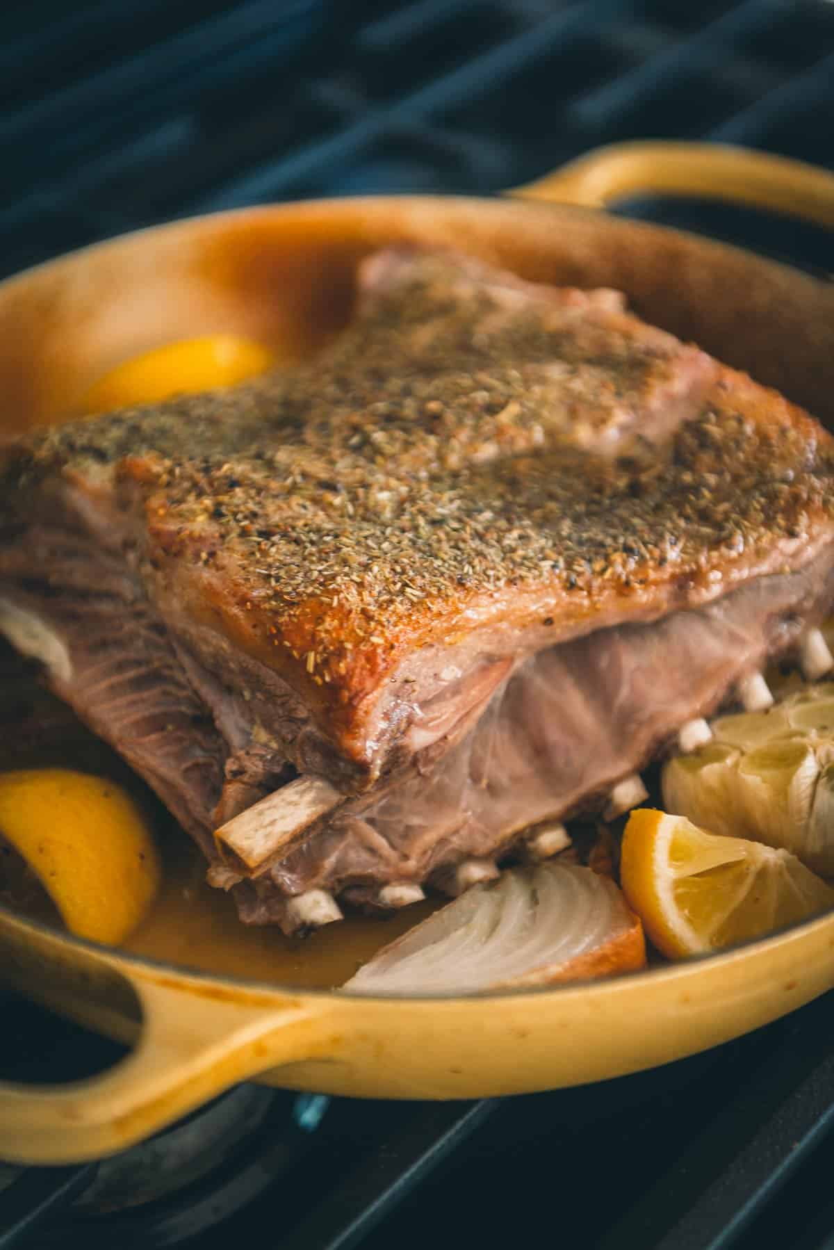 The slow roasted lamb ribs with a beautiful crust forming.
