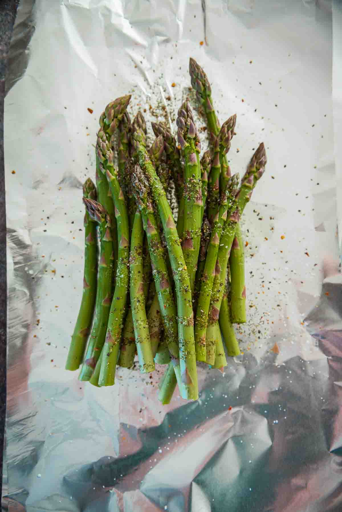 The veggies on foil seasoned ready to be wrapped. 