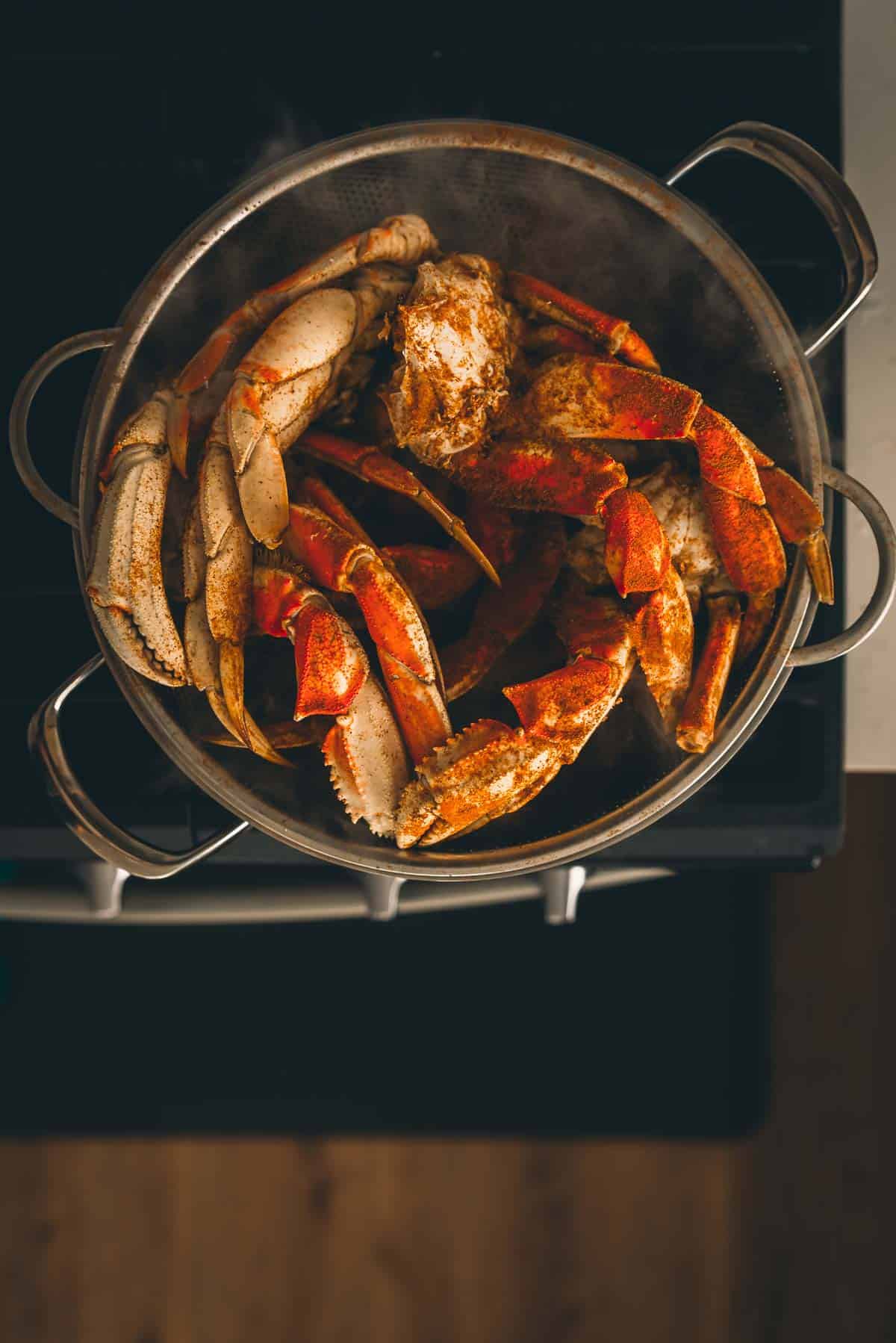 Overhead of pot with crab in it. 