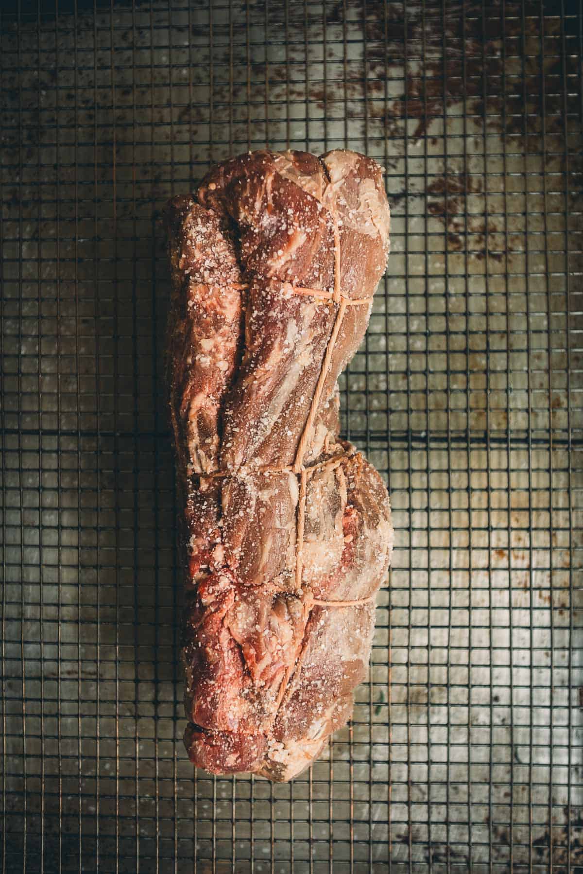 Whole tenderloin, coated with salt.