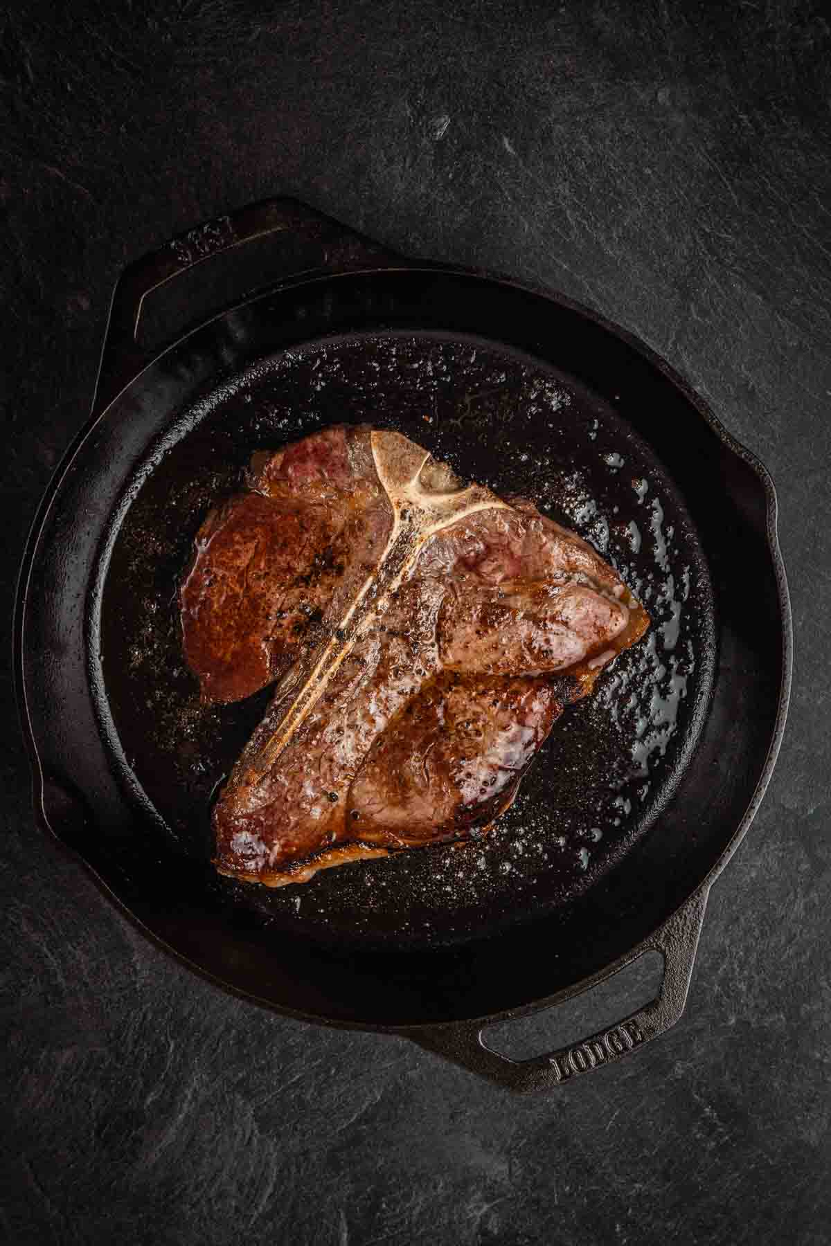 Porterhouse steak in cast iron. 