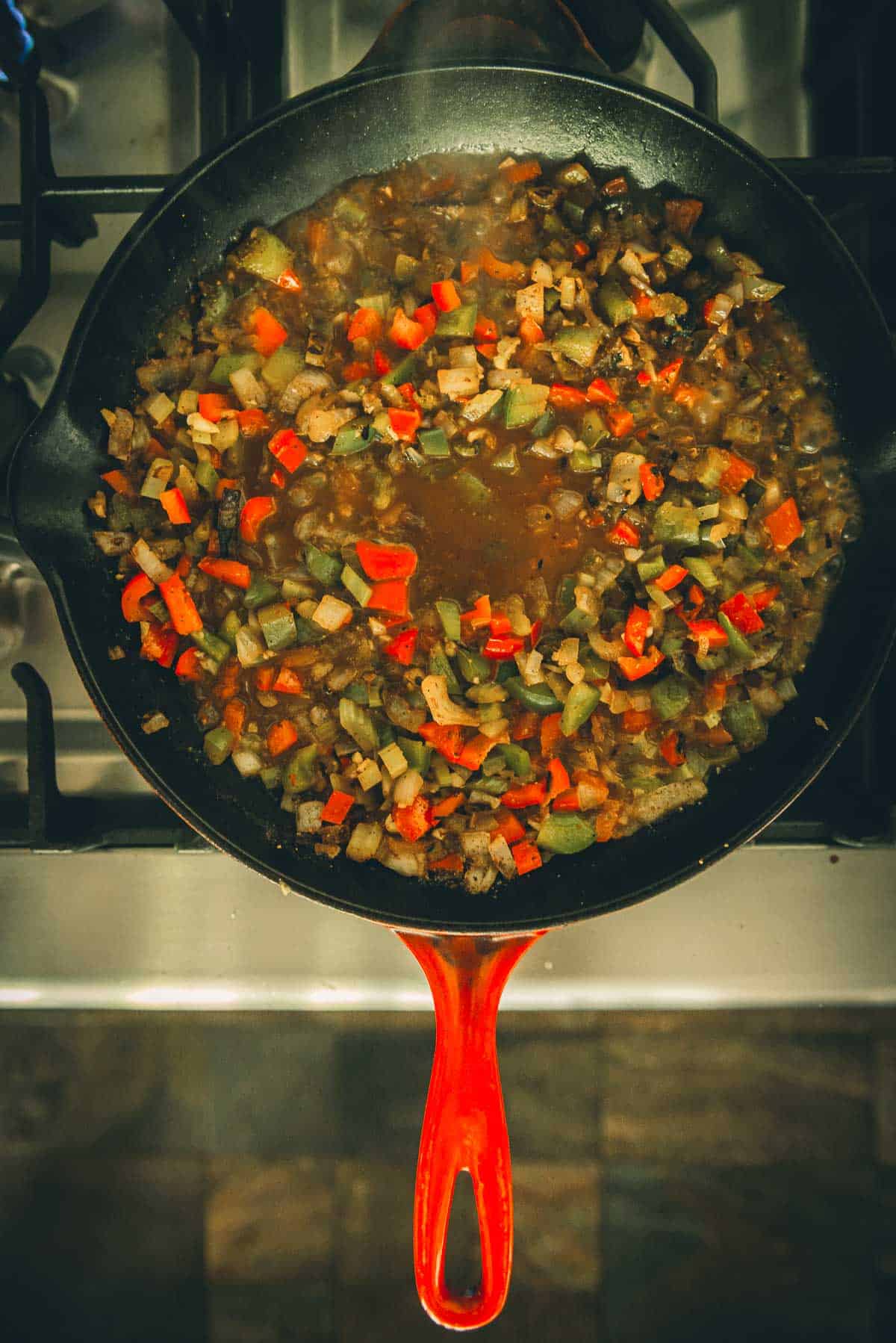 Liquid added to the sautéed veggies. 