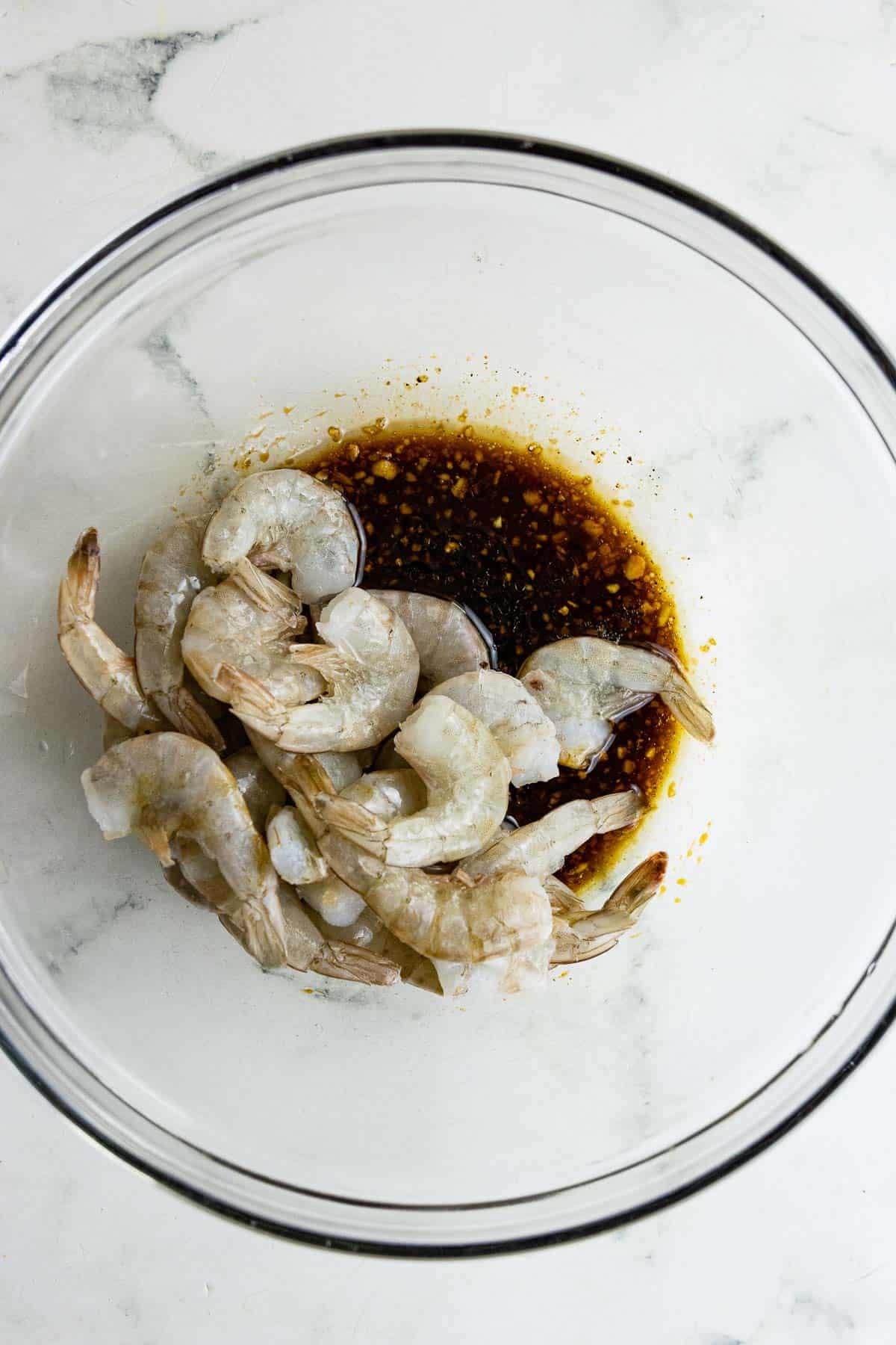 Thawed shrimp added to the bowl. 