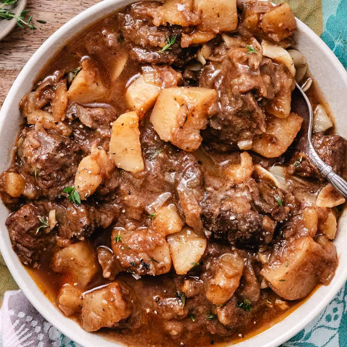 Bowl of Hungarian goulash with a spoon.