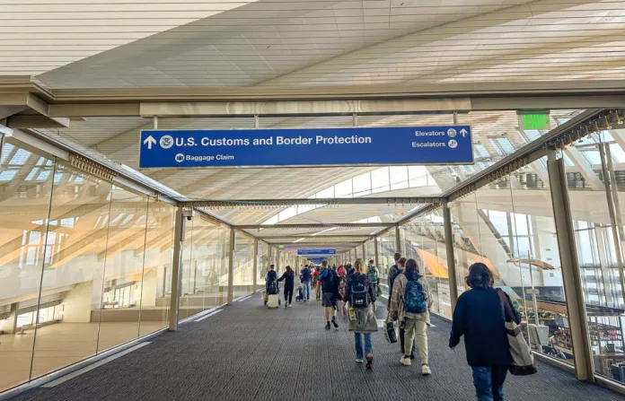 Arrivals walking toward customs