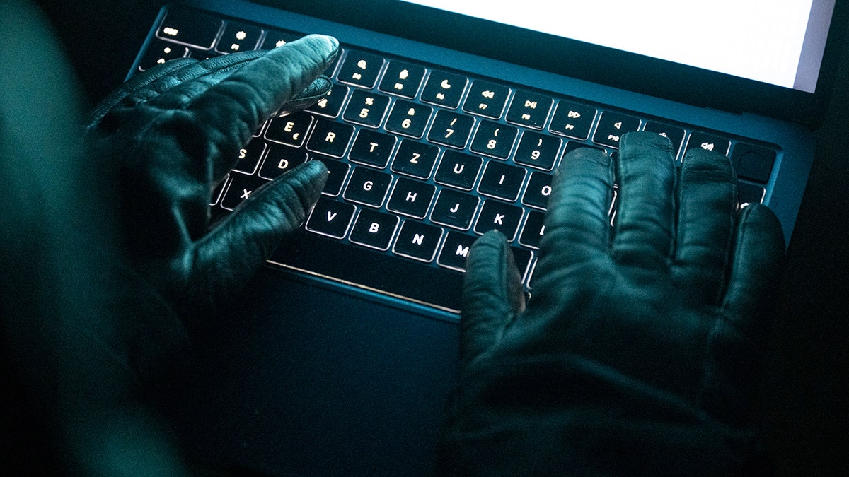 Hacker committing cybercrimes.