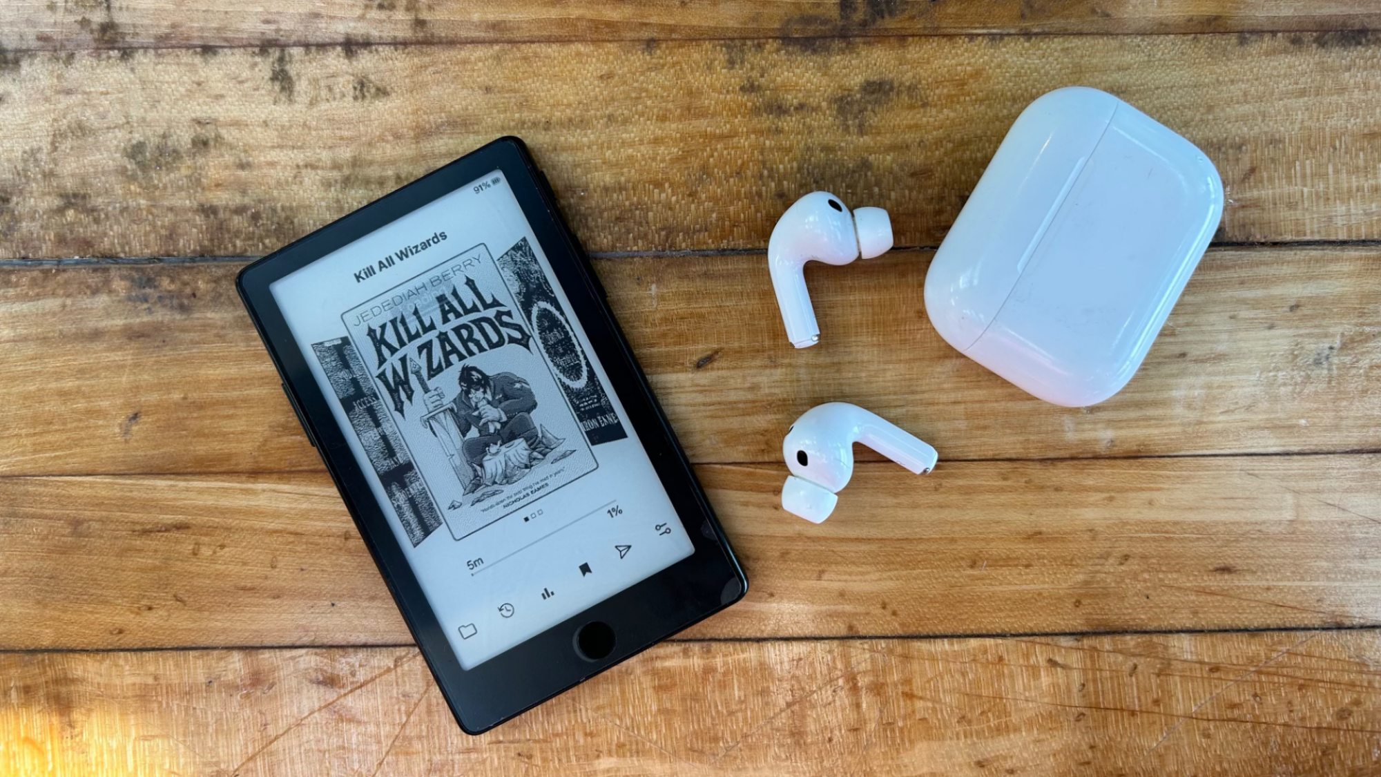 THe Xteink X4 Pro next to a set of AirPods Pro 3 for scale