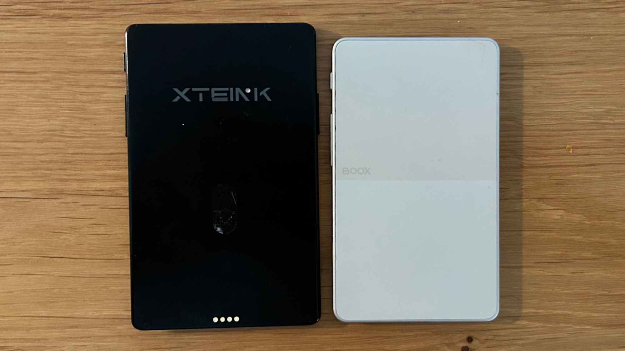The Boox Pico next to the X4 Pro,, showing the back
