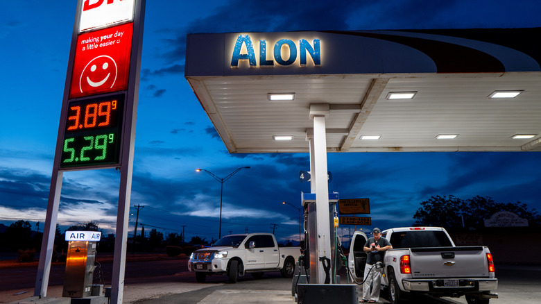 A person pumps diesel at a Alon gas station on August 13, 2026 in El Paso, Texas.