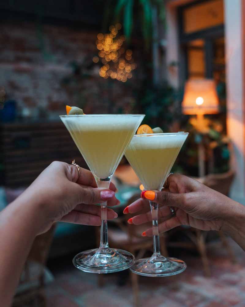 drinks in a hidden garden at maison soclo in Toulouse