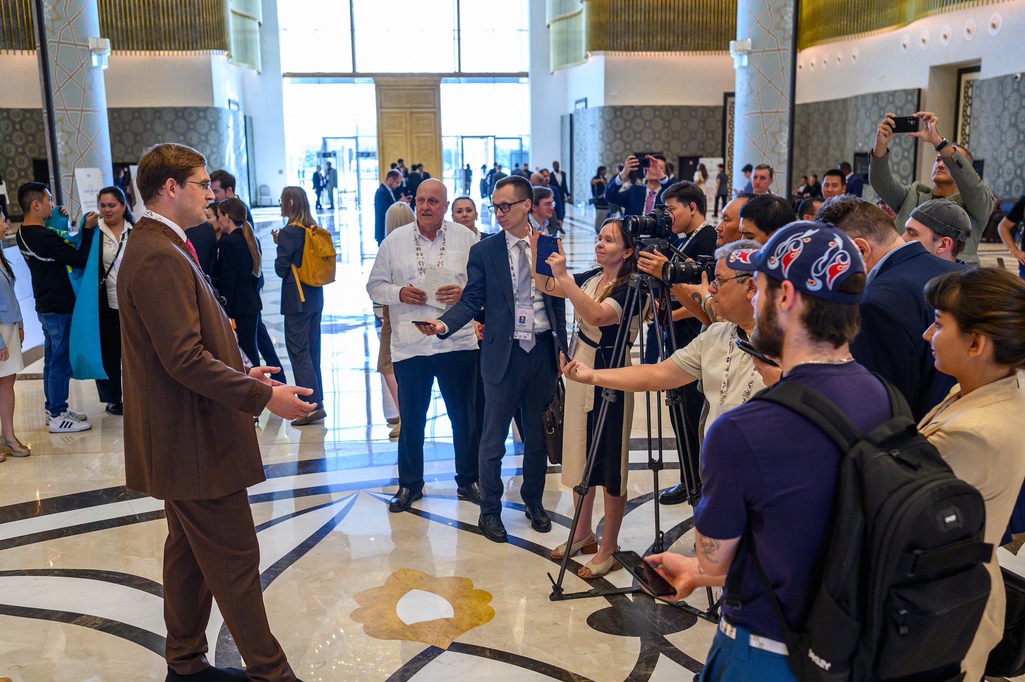 Timur Turlov meeting press and supporters after the election in Samarkand. Photo: Michal Walusza/FIDE.
