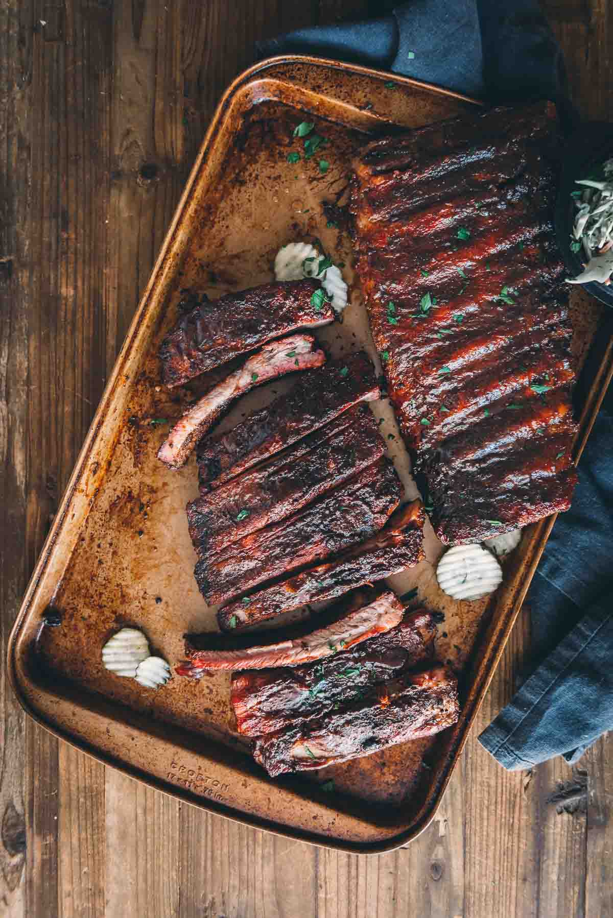 Racks of smoked ribs sliced for enjoying. 