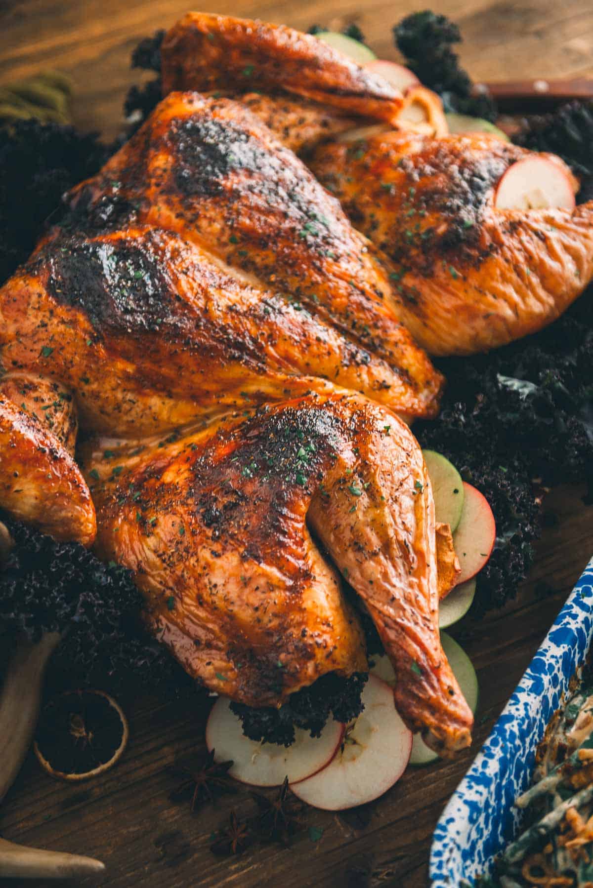 Spatchcocked turkey on a platter for serving. 
