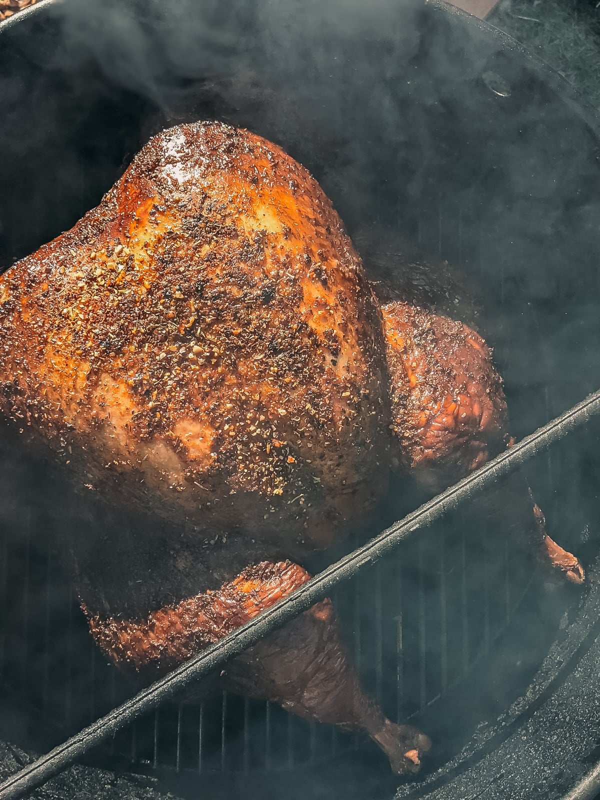 Spatchcock turkey on a grill.