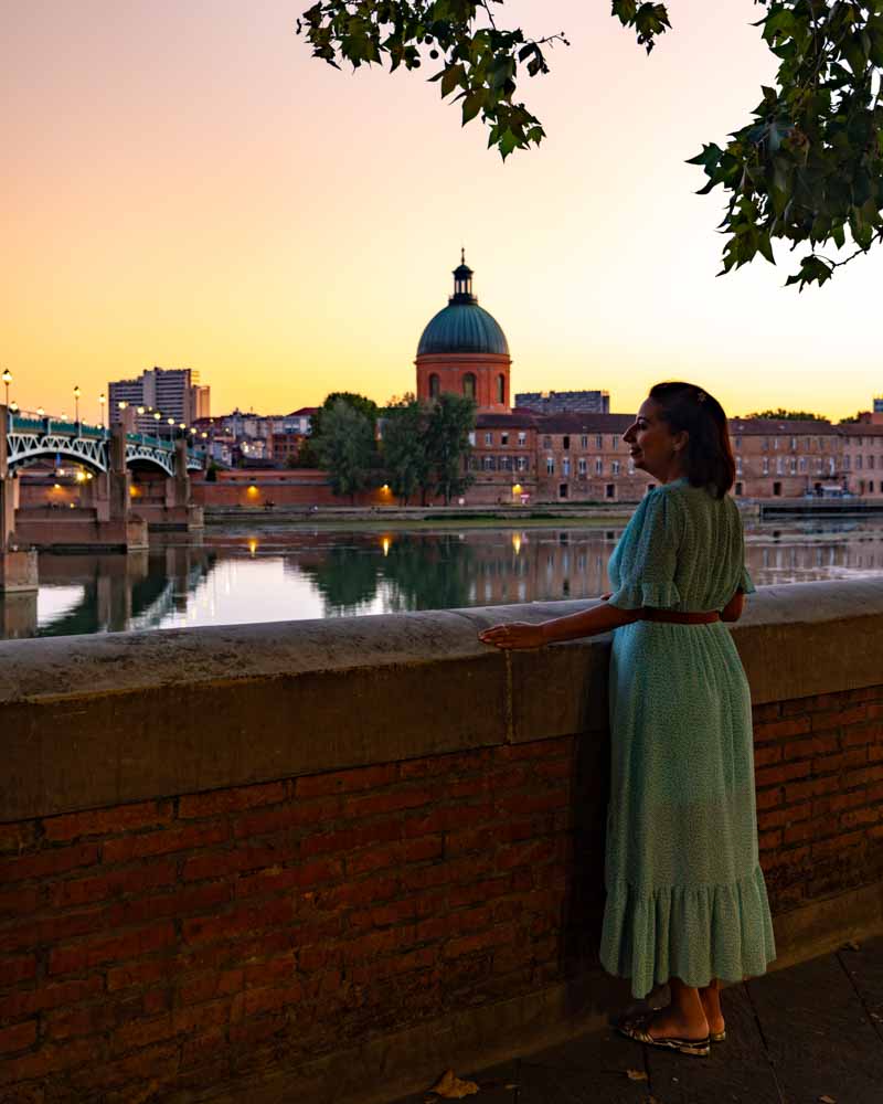 female looking at sunset in Toulouse best things to do 