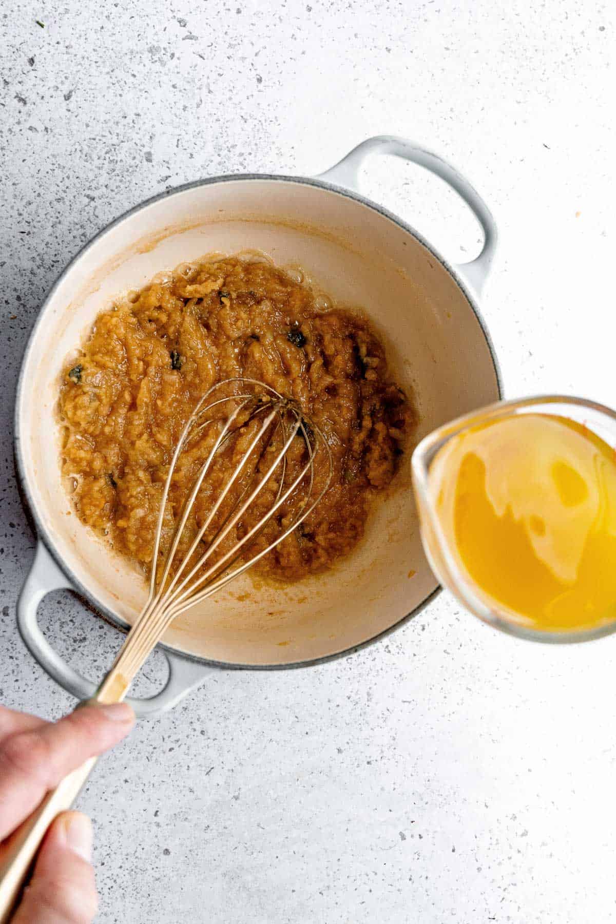 Adding the broth.