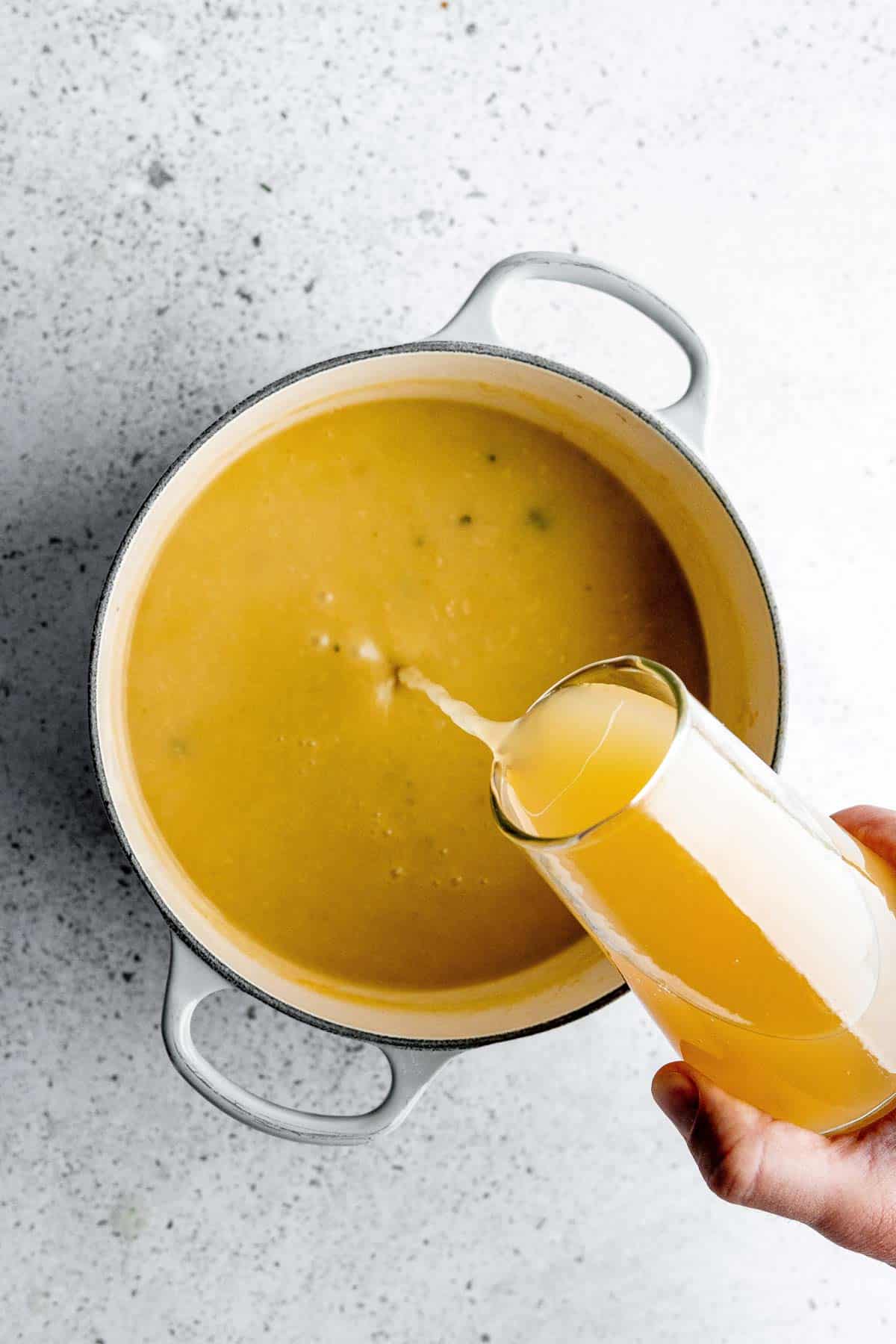 Apple cider added to the roux.