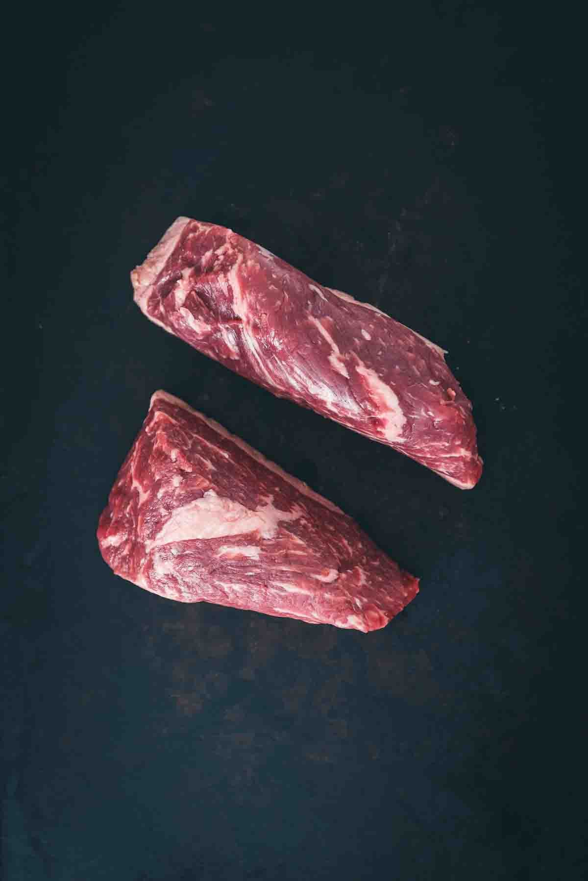 Raw Newport steaks.