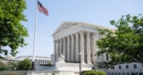 Trump administration, states urge justices to allow full implementation of executive order on mail-in voting