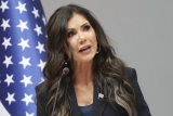 Kristi Noem pushes a ‘full travel ban’ in wake of DC shooting