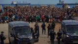 Spanish protesters and migrants clash with police in Ceuta