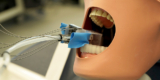 A mini robot to simplify dental treatment
