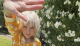 WATCH: Elaine Walker Blends Science Fiction and Microtonal Music on New ‘MACROCHIP’ Mini-Movie Album