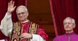 What do his papal garments mean?