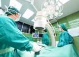 Restoring surgeons’ sense of touch with robotic fingertips