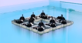 Robotic tiles autonomously Lego-snap into floating smart structures